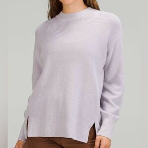 Lululemon wool blend ribbed pullover sweater.  Splits at hemline. Size 6.